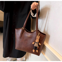 Elegant Women's Leather Tote Bag with Playful Charm
