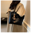 Elegant Women's Leather Tote Bag with Playful Charm