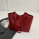 Elegant Women's Leather Tote Bag with Playful Charm