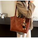 Elegant Women's Leather Tote Bag with Playful Charm