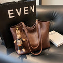 Elegant Women's Leather Tote Bag with Playful Charm