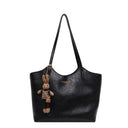 Elegant Women's Leather Tote Bag with Playful Charm