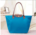 Elegance Urban Women’s Handbag – Spacious Nylon Bag with Leather Handles & Button Closure