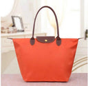 Elegance Urban Women’s Handbag – Spacious Nylon Bag with Leather Handles & Button Closure